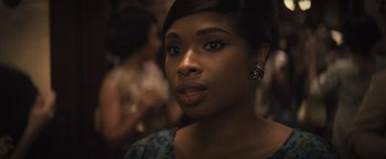 Movie still from “Respect” (2021), directed by Liesl Tommy – A person wearing a blue shirt; Close Up shot, Over the shoulder angle