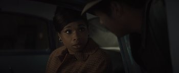 Movie still from “Respect” (2021), directed by Liesl Tommy – A man and a woman are sitting in a car together; Close Up shot, Over the shoulder angle