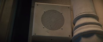 Movie still from “Respect” (2021), directed by Liesl Tommy – A white box sitting on top of a floor; Extreme Close Up shot, Overhead angle