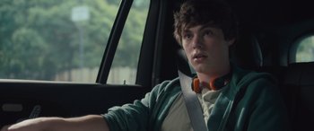 Movie still from “Retribution” (2023), directed by Nimród Antal – A man sitting in the driver's seat of a car; Close Up shot, Over the shoulder angle
