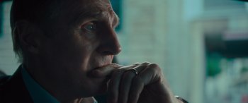 Movie still from “Retribution” (2023), directed by Nimród Antal – An older man is looking out the window; Close Up shot, Over the shoulder angle