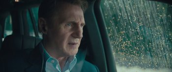 Movie still from “Retribution” (2023), directed by Nimród Antal – A person in a car; Close Up shot, Over the shoulder angle