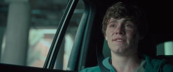 Movie still from “Retribution” (2023), directed by Nimród Antal – A man sitting in the driver's seat of a car; Close Up shot, Over the shoulder angle