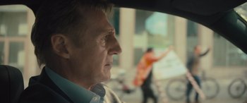 Movie still from “Retribution” (2023), directed by Nimród Antal – A person in a car; Close Up shot, Over the shoulder angle