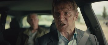 Movie still from “Retribution” (2023), directed by Nimród Antal – A person in a car; Close Up shot, Low angle