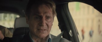 Movie still from “Retribution” (2023), directed by Nimród Antal – A person in a car looking at the camera; Close Up shot, Over the shoulder angle