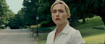 Movie still from “Revolutionary Road” (2008), directed by Sam Mendes – A person wearing a white shirt; Close Up shot, Low angle
