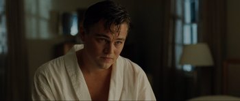 Movie still from “Revolutionary Road” (2008), directed by Sam Mendes – A person wearing a robe; Close Up shot, Low angle