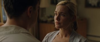 Movie still from “Revolutionary Road” (2008), directed by Sam Mendes – A person looking at another person; Close Up shot, Over the shoulder angle