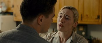 Movie still from “Revolutionary Road” (2008), directed by Sam Mendes – A man and a woman talking to each other; Close Up shot, Over the shoulder angle