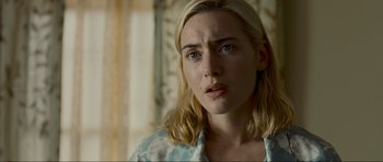 Movie still from “Revolutionary Road” (2008), directed by Sam Mendes – A person wearing a blue shirt; Close Up shot, Over the shoulder angle
