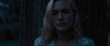 Movie still from “Revolutionary Road” (2008), directed by Sam Mendes – A person with long blonde hair; Close Up shot, High angle