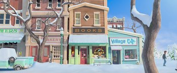 Movie still from “Rio” (2011), directed by Carlos Saldanha – A painting of a store front with a bench in front of it; Extreme Wide shot, High angle