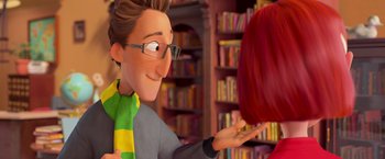 Movie still from “Rio” (2011), directed by Carlos Saldanha – A cartoon of a man holding a red hair wig; Close Up shot, Over the shoulder angle