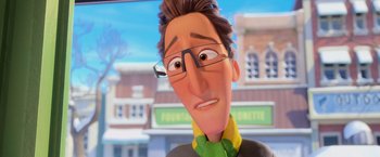 Movie still from “Rio” (2011), directed by Carlos Saldanha – A cartoon of a man wearing glasses and a green shirt; Close Up shot, Over the shoulder angle