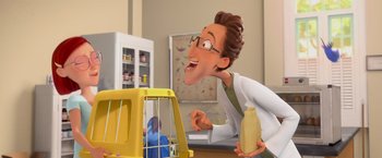 Movie still from “Rio” (2011), directed by Carlos Saldanha – A cartoon of a man holding a bird in a cage; Medium shot, Low angle