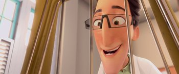 Movie still from “Rio” (2011), directed by Carlos Saldanha – A man with glasses is smiling for the camera; Extreme Close Up shot, Low angle