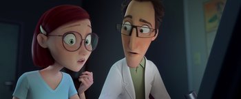 Movie still from “Rio” (2011), directed by Carlos Saldanha – A woman and a man wearing glasses and a lab coat; Medium shot, Over the shoulder angle