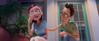 Movie still from “Rio” (2011), directed by Carlos Saldanha – An animated woman covering her face with her hand while a man sits next to her with his hand on her face; Medium shot, Over the shoulder angle