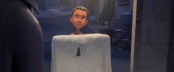 Movie still from “Rio” (2011), directed by Carlos Saldanha – A cartoon of a young boy looking over the back of a chair; Medium shot, Over the shoulder angle