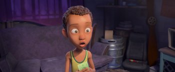 Movie still from “Rio” (2011), directed by Carlos Saldanha – A cartoon of a boy holding a piece of paper in his hand; Close Up shot, Over the shoulder angle