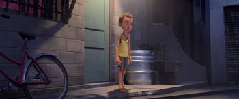 Movie still from “Rio” (2011), directed by Carlos Saldanha – A cartoon of a boy standing in front of a building; Medium shot, Over the shoulder angle
