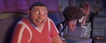 Movie still from “Rio” (2011), directed by Carlos Saldanha – A couple of people that are sitting on a couch; Close Up shot, Over the shoulder angle