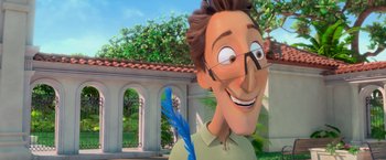 Movie still from “Rio” (2011), directed by Carlos Saldanha – A man with glasses is holding a blue feather; Close Up shot, Low angle