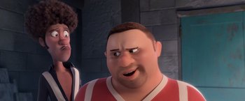 Movie still from “Rio” (2011), directed by Carlos Saldanha – An animated man with a surprised look on his face; Close Up shot, Over the shoulder angle
