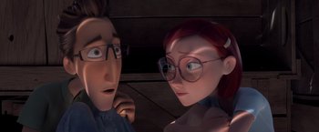 Movie still from “Rio” (2011), directed by Carlos Saldanha – A man and a woman wearing glasses looking at each other; Close Up shot, Over the shoulder angle
