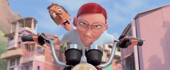 Movie still from “Rio” (2011), directed by Carlos Saldanha – An animated woman riding a bike with a man on the back of it; Close Up shot, Low angle