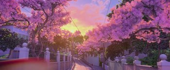 Movie still from “Rio” (2011), directed by Carlos Saldanha – A painting of a street lined with pink trees; Extreme Wide shot, Low angle