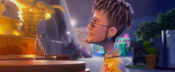 Movie still from “Rio” (2011), directed by Carlos Saldanha – A person with a beard and glasses is looking at a banana peel; Close Up shot, Over the shoulder angle