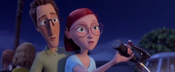 Movie still from “Rio” (2011), directed by Carlos Saldanha – An animated woman holding a microphone next to a man; Close Up shot, High angle