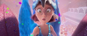 Movie still from “Rio” (2011), directed by Carlos Saldanha – An animated girl with glasses and a hat on her head looking surprised; Close Up shot, Over the shoulder angle