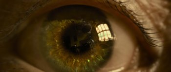 Movie still from “Rise of the Planet of the Apes” (2011), directed by Rupert Wyatt – An image of an eye that is looking at the camera; Extreme Close Up shot, Overhead angle