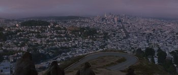Movie still from “Rise of the Planet of the Apes” (2011), directed by Rupert Wyatt – A view of a city from the top of a hill; Extreme Wide shot, High angle