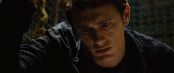 Movie still from “Rise of the Planet of the Apes” (2011), directed by Rupert Wyatt – A person with his eyes wide open; Close Up shot, Low angle