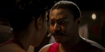 Movie still from “Roald Dahl's Matilda the Musical” (2022), directed by Matthew Warchus – A man and a woman face to face in the dark; Close Up shot, Over the shoulder angle