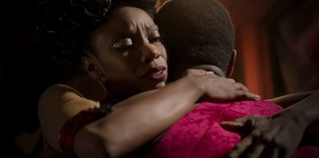 Movie still from “Roald Dahl's Matilda the Musical” (2022), directed by Matthew Warchus – A man and a woman embracing each other; Close Up shot, Over the shoulder angle