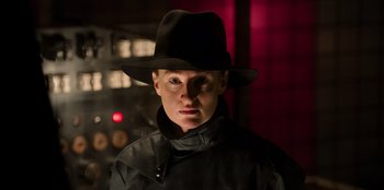 Movie still from “Roald Dahl's Matilda the Musical” (2022), directed by Matthew Warchus – A man wearing a black hat and a black jacket; Close Up shot, Low angle