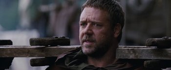 Movie still from “Robin Hood” (2010), directed by Ridley Scott – A person with a beard; Close Up shot, Over the shoulder angle