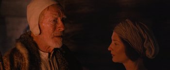 Movie still from “Robin Hood” (2010), directed by Ridley Scott – An older man and a younger woman face to face; Close Up shot, Over the shoulder angle