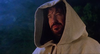 Movie still from “Robin Hood: Prince of Thieves” (1991), directed by Kevin Reynolds – A person wearing a hooded shirt; Close Up shot, Low angle