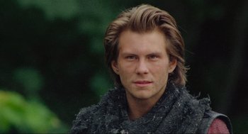 Movie still from “Robin Hood: Prince of Thieves” (1991), directed by Kevin Reynolds – A person with long hair; Close Up shot, Low angle