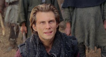 Movie still from “Robin Hood: Prince of Thieves” (1991), directed by Kevin Reynolds – A person with long hair; Close Up shot, Low angle