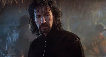 Movie still from “Robin Hood: Prince of Thieves” (1991), directed by Kevin Reynolds – A person with long hair; Close Up shot, Low angle