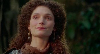 Movie still from “Robin Hood: Prince of Thieves” (1991), directed by Kevin Reynolds – A person with curly hair; Close Up shot, Low angle