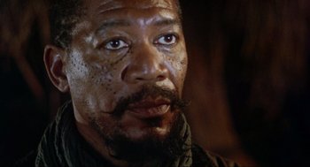 Movie still from “Robin Hood: Prince of Thieves” (1991), directed by Kevin Reynolds – A person with a beard and a mustache; Close Up shot, Low angle