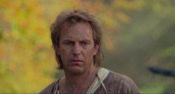Movie still from “Robin Hood: Prince of Thieves” (1991), directed by Kevin Reynolds – A person with long hair; Close Up shot, Low angle